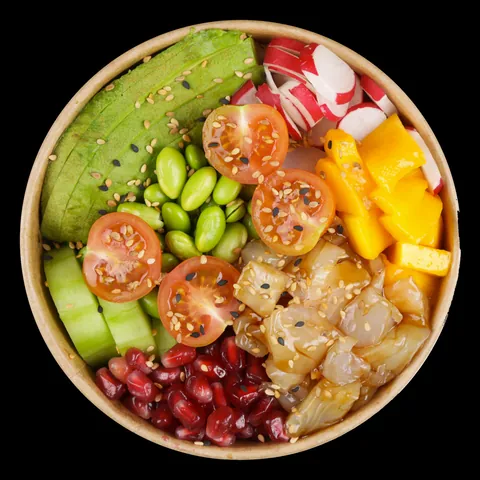 Poke bowl daurade mangue grenade de Mas Sushi vu de dessus, dans un bol kraft