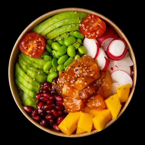 Poke bowl saumon mangue grenade de Mas Sushi vu de dessus, dans un bol kraft